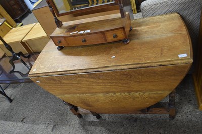 Lot 276 - Early 20th Century oak drop leaf dining table...