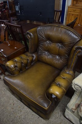 Lot 301 - Brown leather armchair
