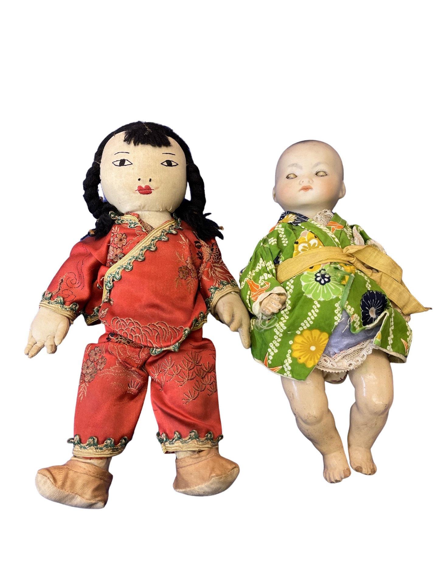 Lot 41 A pair of small Oriental dolls. Armand