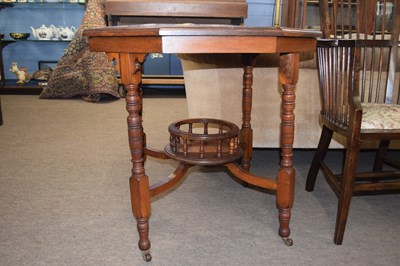 Lot 555 - Late Victorian American walnut centre table...