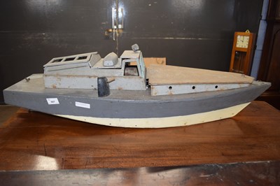 Lot 607 - Vintage wood and metal toy boat with engine,...