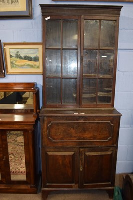 Lot 641 - Small Georgian mahogany secretaire bookcase...