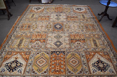 Lot 657 - Large 20th Century wool floor rug decorated...