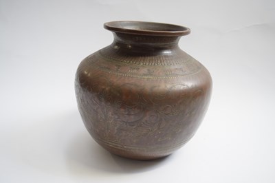 Lot 314 - Copper pot with a incised foliage design, 17cm...