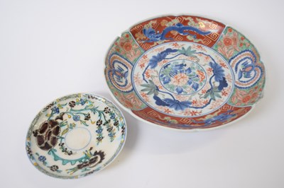 Lot 323 - Japanese porcelain dish decorated in Imari...