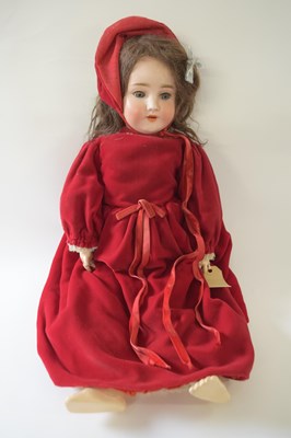 Lot 371 - German bisque headed doll in original clothing,...
