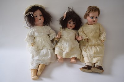 Lot 377 - Three smaller dolls including a Limoges doll...