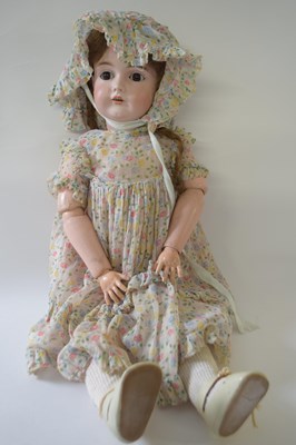 Lot 379 - German bisque headed doll in original clothing