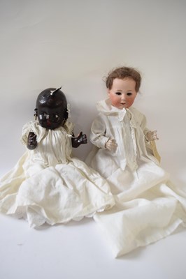 Lot 383 - Two further dolls, one with a Heubach bisque...