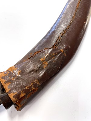 Lot 110 - 20th Century Nepalese/Indian kukri in leather...