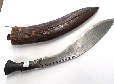 Lot 110 - 20th Century Nepalese/Indian kukri in leather...