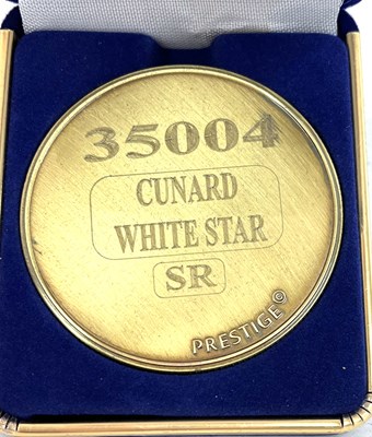 Lot 210 - A commemorative gold award medallion to 35004...