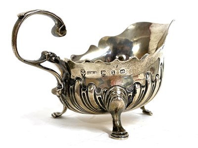 Lot 19 - Victorian silver cream jug having a part...