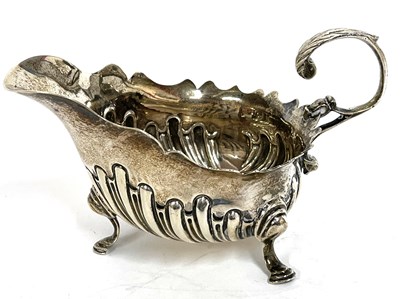 Lot 19 - Victorian silver cream jug having a part...