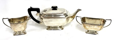 Lot 24 - Art Deco silver three piece tea set of plain...