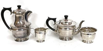 Lot 28 - George VI silver four piece tea set comprising...