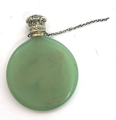 Lot 48 - Vintage green glass scent bottle of flat...