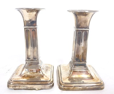 Lot 59 - Small pair of Edwardian silver candlesticks...