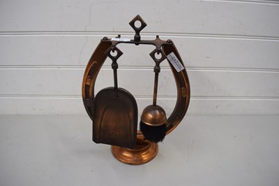 Lot 65 - COPPER FIRE TOOL STAND FORMED AS A HORSESHOE
