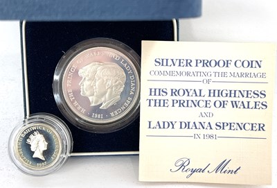 Lot 329 - A pair of cased coins to include: A 1981...