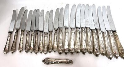 Lot 124 - Eleven German 800 marked handle table knives...