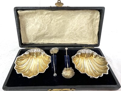 Lot 138 - Cased pair of Edwardian silver shell salts and...