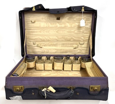 Lot 146 - Vintage purple leather dressing case, part...