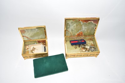 Lot 109 - Two polished green onyx boxes containing...