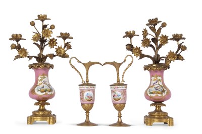 Lot 87 - A pair of 19th century Sevres style candelabra...