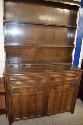 Lot 238 - 20th Century oak dresser cabinet with carved...