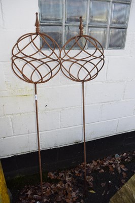 Lot 394 - Pair of iron spherical garden ornaments