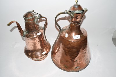 Lot 186 - Two Middle Eastern copper jugs or kettles