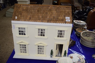 Lot 134 - A modern cream painted dolls house