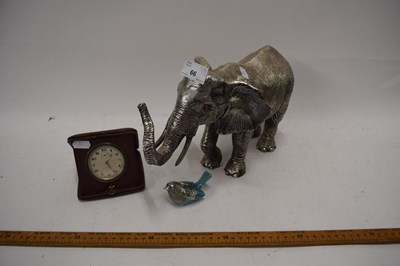 Lot 66 - Silvered resin model of an elephant together...