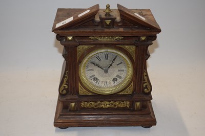 Lot 82 - Late 19th Century mantel clock with oak and...