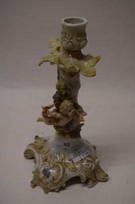 Lot 93 - Continental porcelain candlestick with cherub...