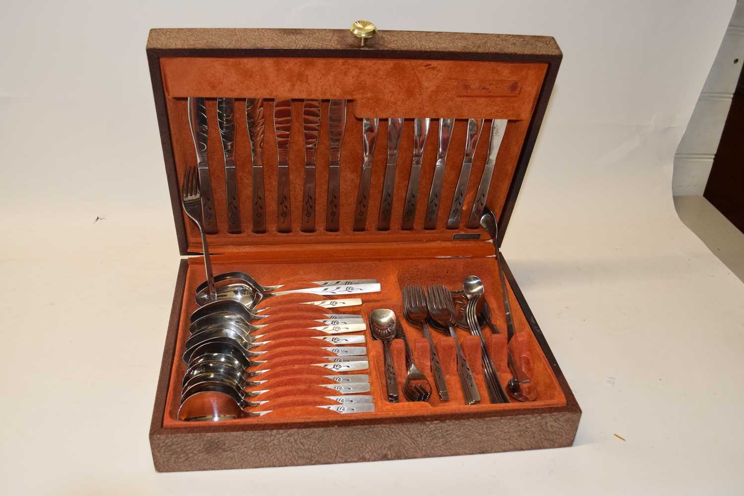 Lot 96 - Canteen of mid Century stainless steel cutlery...
