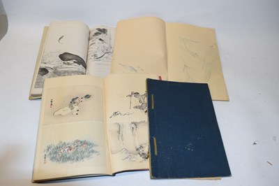 Lot 123 - Three Japanese picture books with a range of...