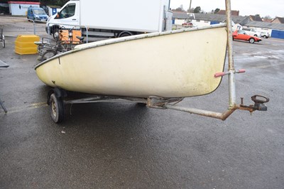 Lot 399 - Sailing dinghy with trailer