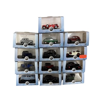 Lot 193 - A collection of case die-cast automobile...