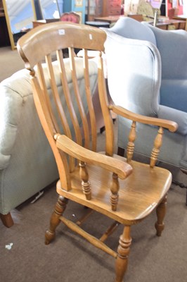 Lot 518 - Late 19th Century elm seated windsor chair...