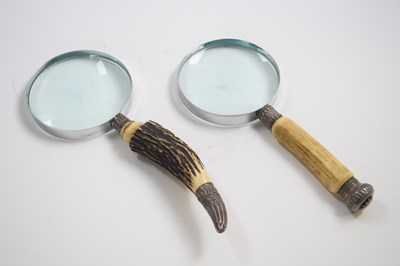 Lot 282 - Two magnifying glasses with horn handles and...