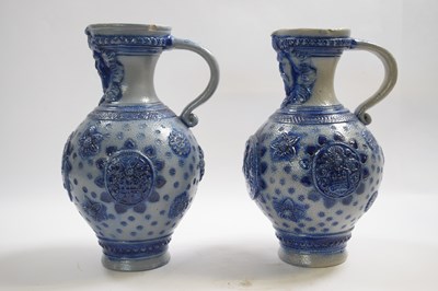 Lot 293 - Two German Rhenish stone ware type ewers with...