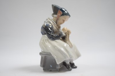 Lot 303 - Royal Copenhagen model of a young girl seated...