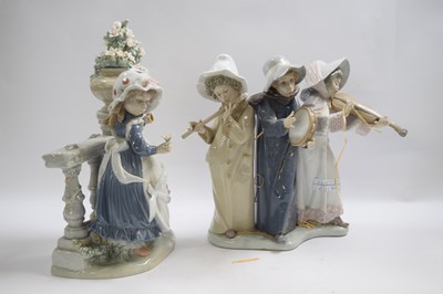 Lot 321 - Lladro group of a young child flower selling...