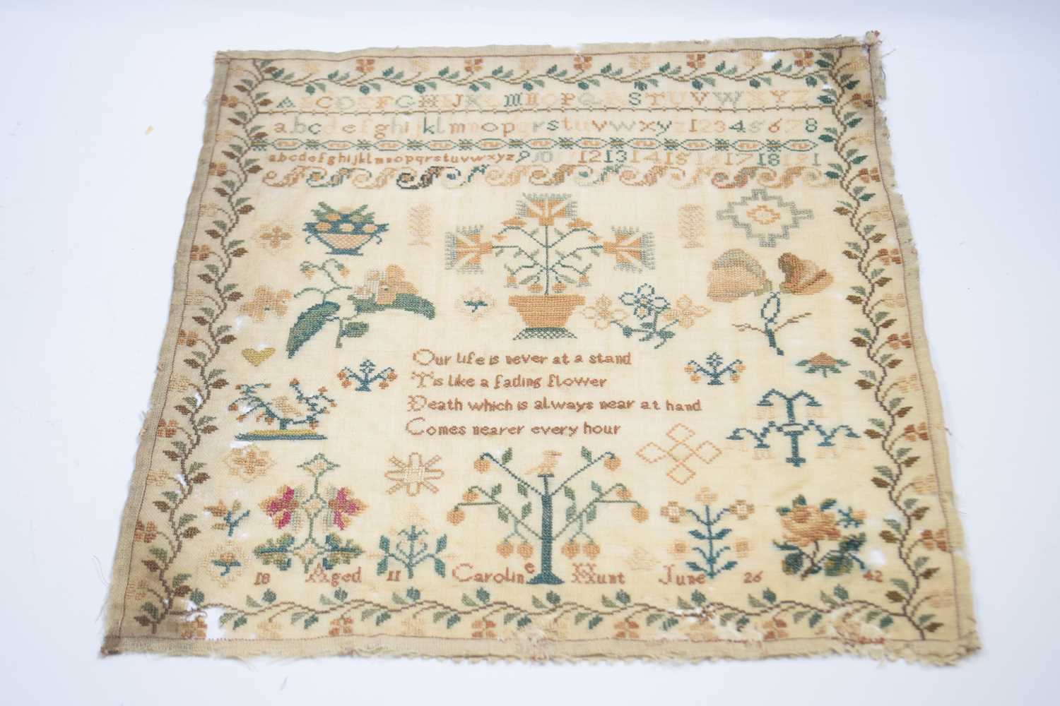 Lot 331 A Small Sampler With Typical Embroidery And Lot 331 a small sampler with typical embroidery and