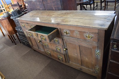 Lot 568 - 18th Century oak dresser base with six drawers...