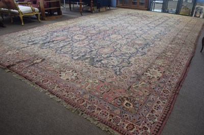 Lot 608 - Extremely large faded caucasian wool rug...