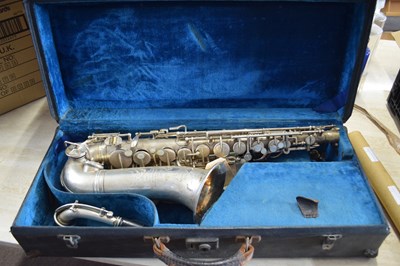 Lot 615 - Vintage Hawkes & Son silver plated saxophone...