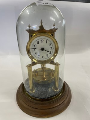 Lot 334 - Anniversary clock under a glass dome